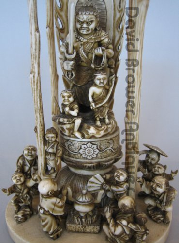 Japanese Ivory group of people around a shrine