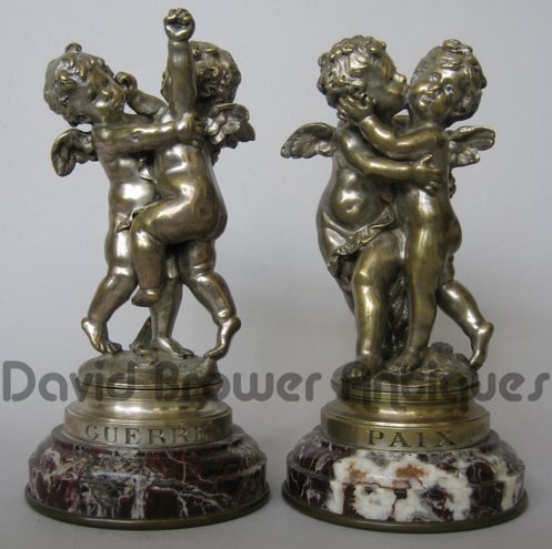 A pair of silvered bronzes entitled War and Peace by Auguste Moreau