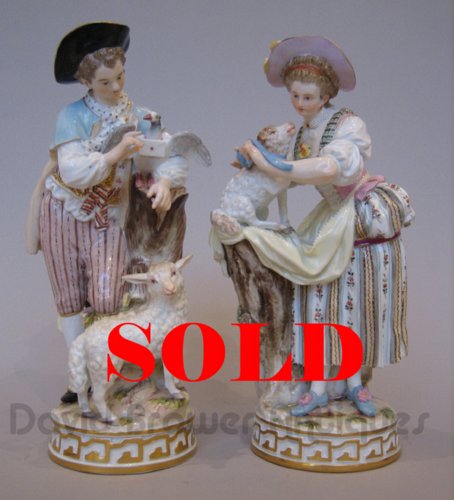 Pair of Meissen figures with sheep