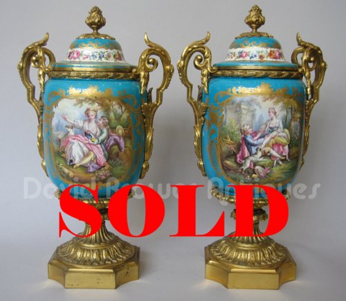 Pair of ormolu mounted Sevres vases