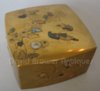 A superb Japanese gold lacquer box of flowers and doves